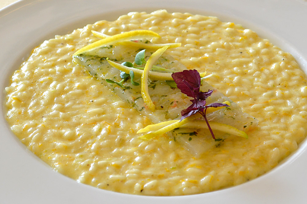 Risotto al cedro e burrata con crudo di scampi