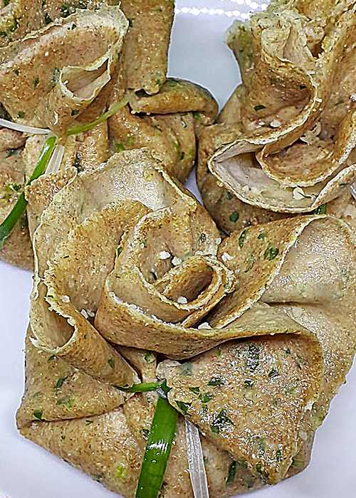 Fagottini di crespelle con ripieno di cavolfiori e caprino